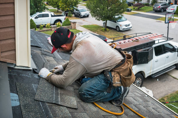 Professional Roofing technician working in Dorchester, MA